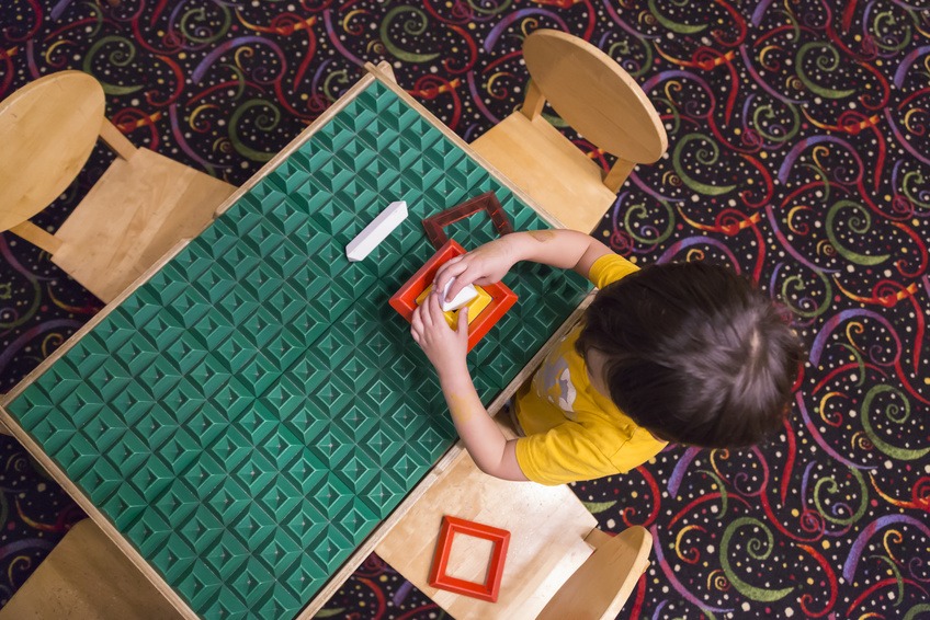 Child playing at special needs school